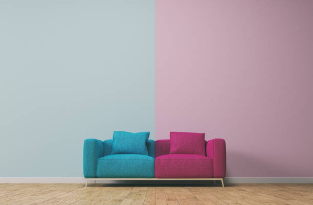 separations of two colors sky blue and pink both on wall and sofa