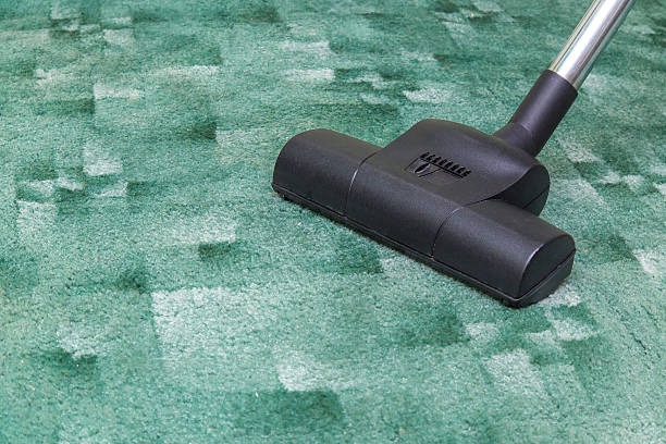 vacuuming carpet