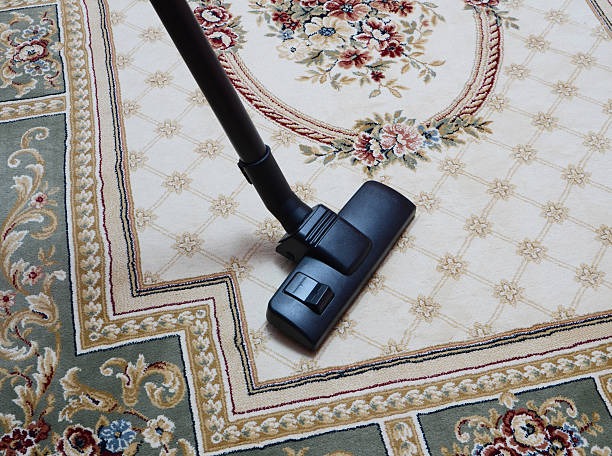 vacuuming on colorful carpet